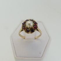 A cultured pearl and garnet Cluster Ring, cluster diameter 11.5mm, mounted in 9ct yellow gold,