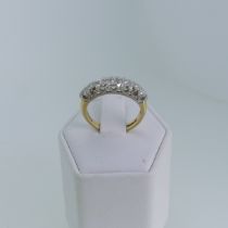 A graduated seven stone diamond Ring, approx. total diamond weight 0.3ct, illusion set in 18ct white