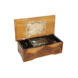 A SWISS FIGURED WALNUT MUSIC BOX, MID 19TH CENTURY