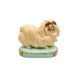 A KITSCH OVERSIZED CERAMIC PEKINGESE DOG SCULPTURE