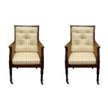A PAIR OF REGENCY STYLE MAHOGANY BERGERE ARMCHAIRS, LATE 19TH CENTURY