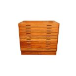 A 20TH CENTURY TEAK PLAN CHEST