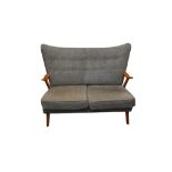 A MID CENTURY WINGBACK SOFA