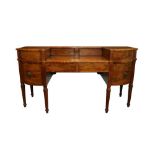 A GEORGE III MAHOGANY BOW FRONT SIDEBOARD