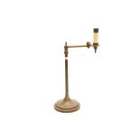 A CONTEMPORARY BRASS ADJUSTABLE TABLE READING LAMP