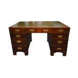 A 19TH CENTURY STYLE MAHOGANY CAMPAIGN PEDESTAL DESK