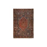 AN ANTIQUE FERAGHAN RUG, WEST PERSIA