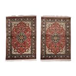 A PAIR OF VERY FINE SILK QUM RUGS, CENTRAL PERSIA