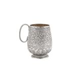 A large late 19th century Anglo – Indian unmarked silver mug, Kashmir circa 1880