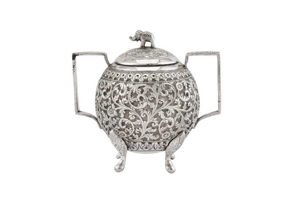 A late 19th century Anglo – Indian unmarked silver covered twin handled sugar bowl, Cutch circa 1890 - Image 2 of 2