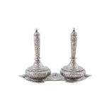 A pair of late 19th / early 20th century Anglo – Indian unmarked silver bottles (surhai), Kashmir ci