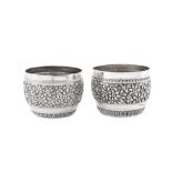 A matched pair of early 20th century Anglo – Indian silver bowls, Madras circa 1910 by P. Orr & Sons