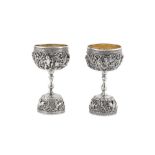 Two early 20th century Burmese unmarked silver double spirit measures (jiggers), Rangoon circa 1920