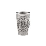 A large late 19th / early 20th century Burmese unmarked silver beaker, Mandalay circa 1900