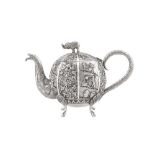 An early 20th century Anglo – Indian unmarked silver teapot, Bombay circa 1910
