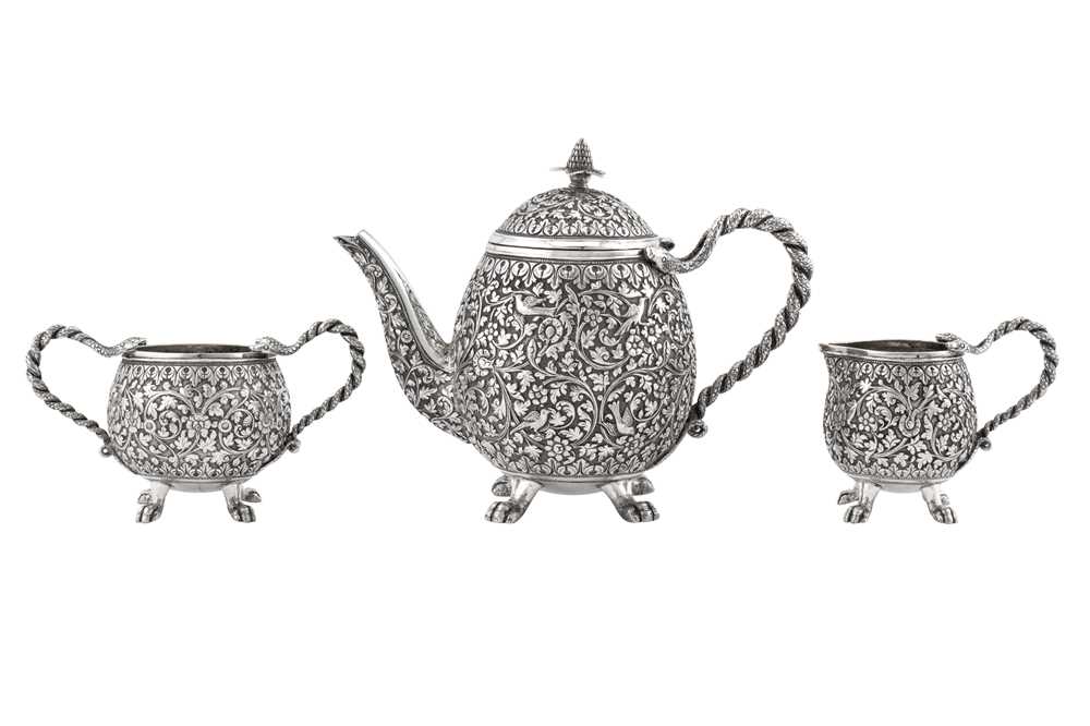 A late 19th century Anglo – Indian unmarked silver three-piece bachelor tea service, Cutch circa 189
