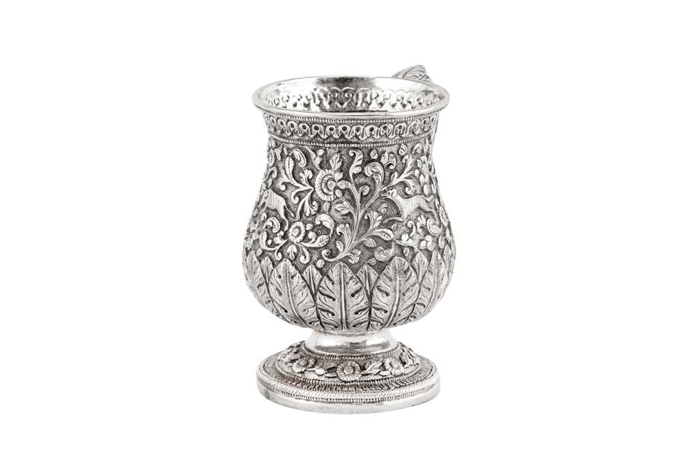 A late 19th century Anglo – Indian unmarked silver mug, Cutch circa 1890 - Image 2 of 4