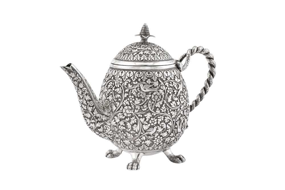 A late 19th century Anglo – Indian unmarked silver three-piece bachelor tea service, Cutch circa 189 - Image 2 of 4