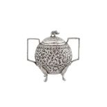 A late 19th century Anglo – Indian unmarked silver covered twin handled sugar bowl, Cutch circa 1890