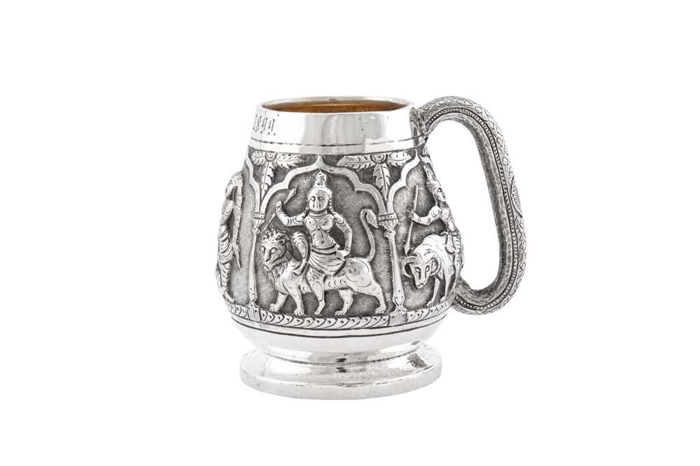 A late 19th century Anglo – Indian unmarked silver christening mug, Madras dated 1899