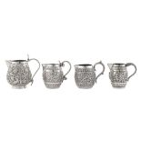 Three early 20th century Anglo – Indian unmarked silver cream jugs, Lucknow circa 1910