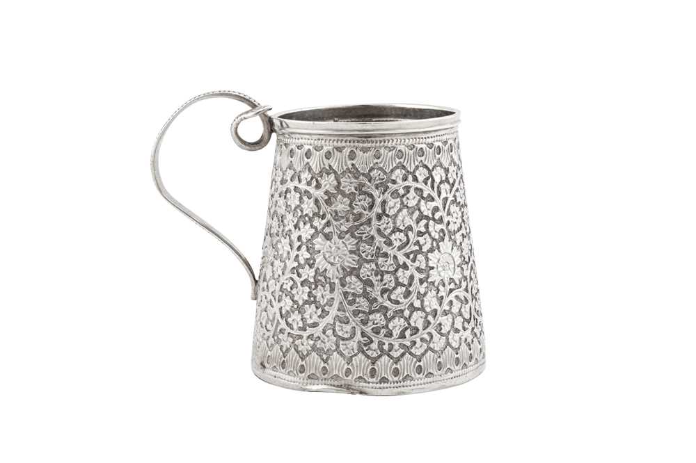 An early 20th century Anglo – Indian unmarked silver christening mug, Kashmir circa 1910