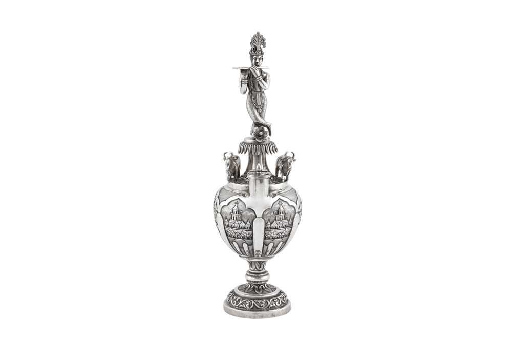 A rare and highly unusual early 20th century Anglo – Indian silver figural rose water sprinkler or s