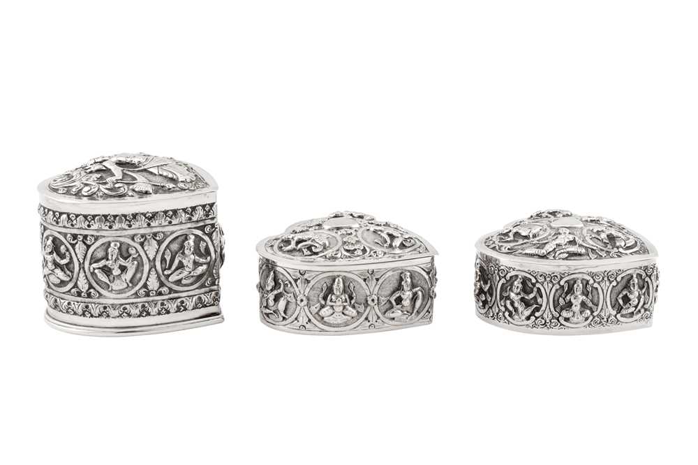 A pair of late 19th / early 20th century Anglo – Indian unmarked silver dressing table boxes, Madras - Image 2 of 2