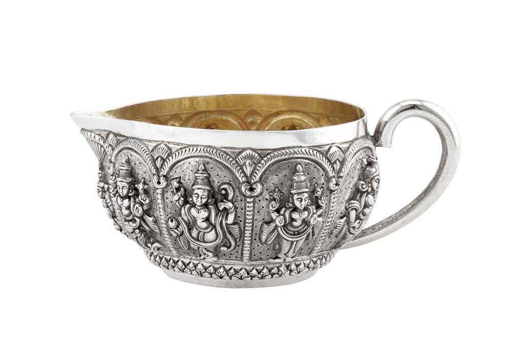 A late 19th century Anglo – Indian silver milk jug, Madras dated 1893