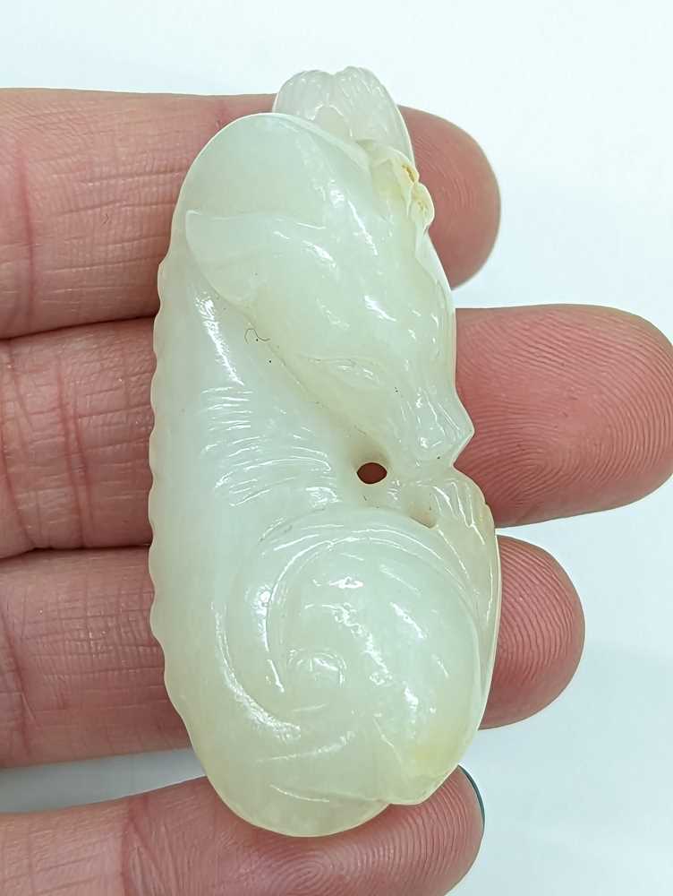 A CHINESE WHITE JADE 'DOG' CARVING 白玉雕犬 - Image 2 of 10