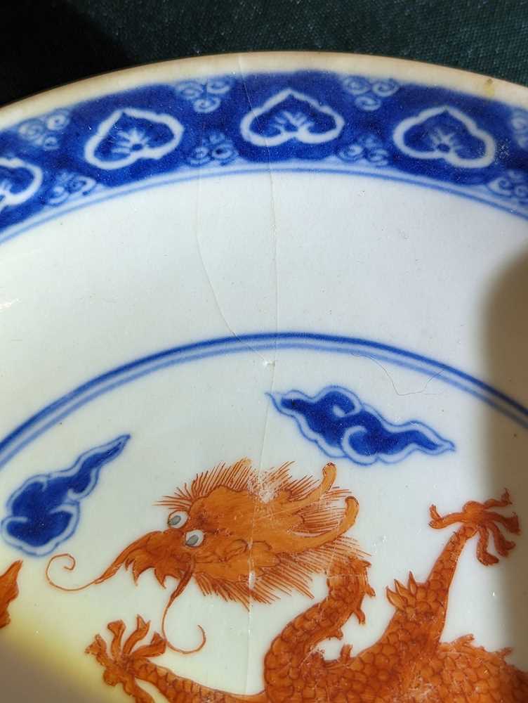 A CHINESE BLUE AND WHITE AND IRON-RED 'DRAGON' DISH 清十九世紀 青花礬紅雲龍紋盤 《彩華堂製》款 - Image 4 of 10