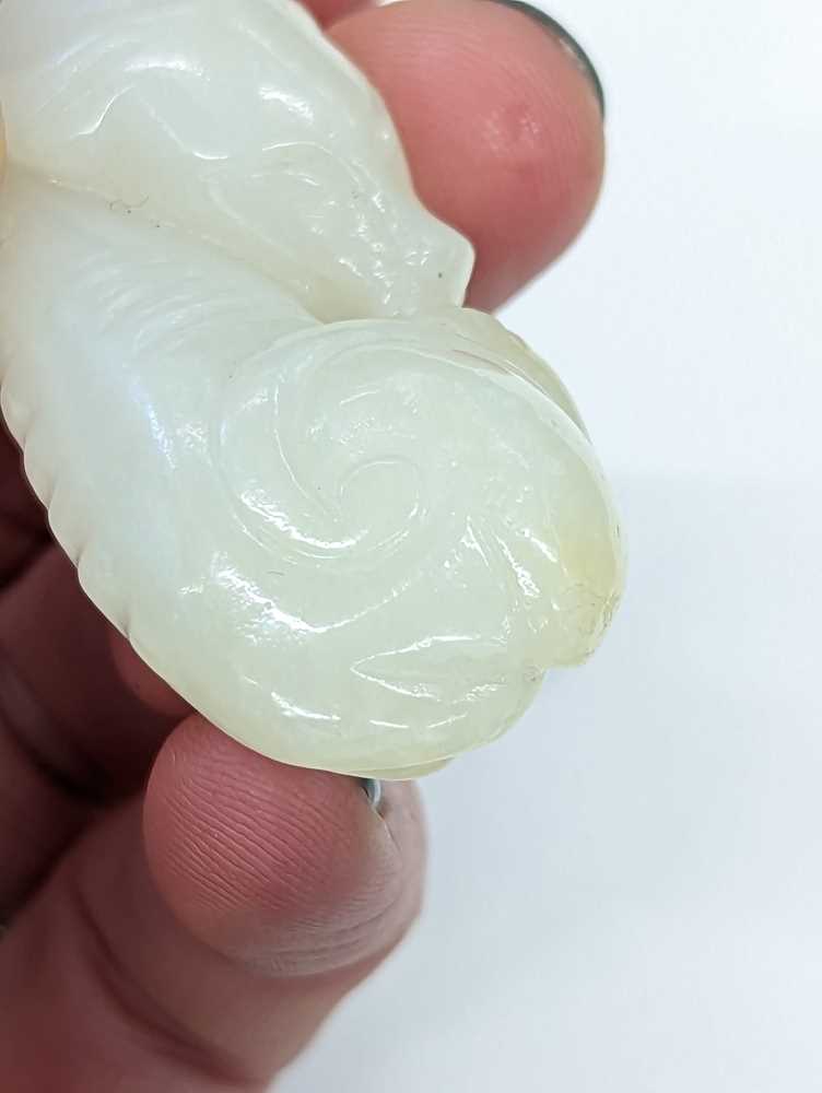 A CHINESE WHITE JADE 'DOG' CARVING 白玉雕犬 - Image 10 of 10