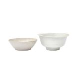 TWO CHINESE WHITE-GLAZED BOWLS 元至明 白釉盌一組兩件