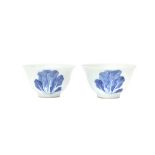 A PAIR OF CHINESE BLUE AND WHITE 'CABBAGE' CUPS