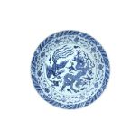 A CHINESE BLUE AND WHITE 'DRAGON AND PHOENIX' CHARGER 青花龍鳳呈祥大盤