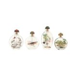 A GROUP OF FOUR CHINESE INSIDE-PAINTED GLASS SNUFF BOTTLES 二十世紀 玻璃內畫鼻煙壺一組