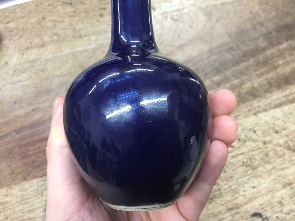 TWO SMALL CHINESE MONOCHROME BLUE-GLAZED VASES 清十八世紀 藍釉長頸撇口瓶及藍釉長頸瓶 - Image 16 of 16