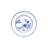 A CHINESE BLUE AND WHITE 'RABBITS' DISH 清十八世紀 青花兔紋盤