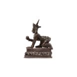 AN INDIAN BRONZE FIGURE OF KRISHNA AS THE BUTTER THIEF