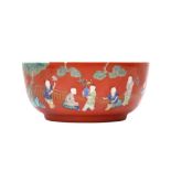 A CHINESE FAMILLE-VERTE CORAL-GROUND 'BOYS' BOWL 珊瑚紅地五彩童子圖紋盌