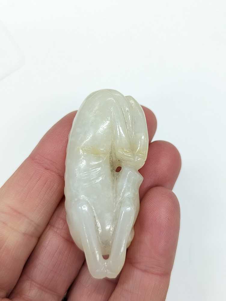 A CHINESE WHITE JADE 'DOG' CARVING 白玉雕犬 - Image 5 of 10