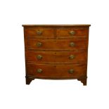 A 19TH CENTURY MAHOGANY BOW FRONT CHEST OF DRAWERS