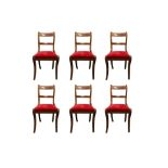 A SET OF SIX REGENCY STYLE BAR BACK MAHOGANY AND BRASS INLAID DINING CHAIRS