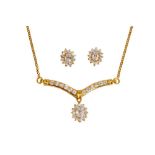 AN IMITATION DIAMOND NECKLACE AND EARSTUD SUITE