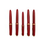 A GROUP OF FIVE RED PARKER FOUNTAIN PENS