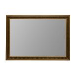 A CONTEMPORARY EMPIRE STYLE WALL MIRROR