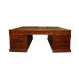 A VICTORIAN FLAME MAHOGANY PARTNERS DESK