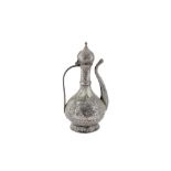 AN ENGRAVED TINNED COPPER EWER Ottoman Turkey, possibly 18th - 19th century