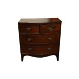 A GEORGE III MAHOGANY BOW FRONT CHEST