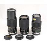 A Group of Three Olympus OM Zoom Lenses.